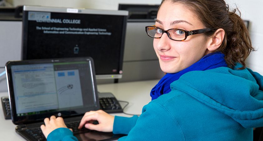 centennial college student working on their laptop accessing an online tutor